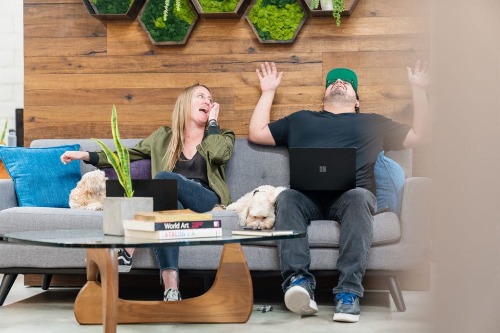 woman-man-laughing-couch